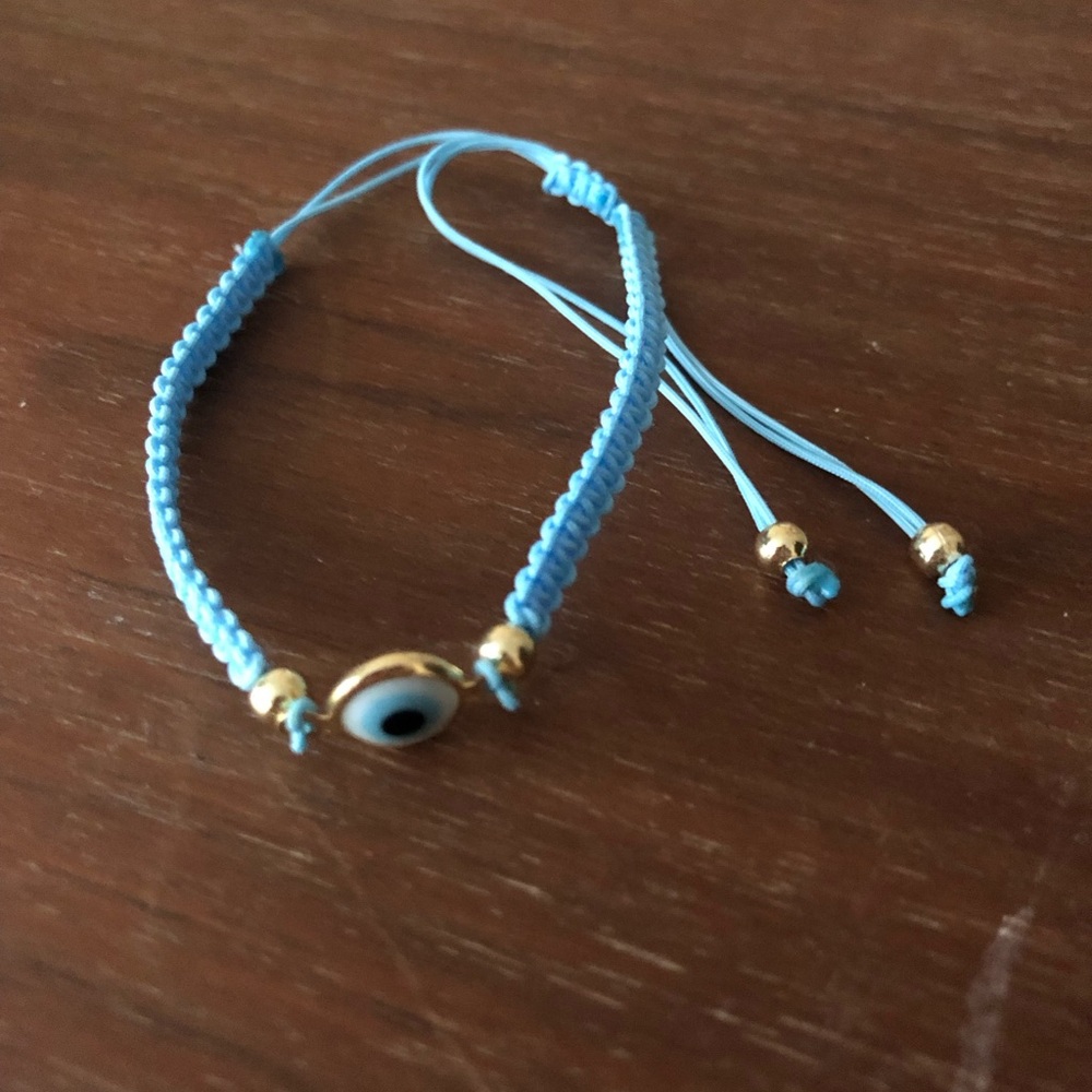 Blue Evil Eye Bracelet with Gold Accents. New/never worn.